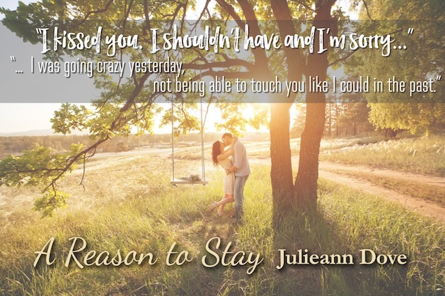 Young kissing couple under big tree with swing at sunset